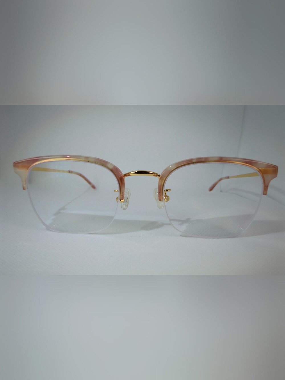 Curie. Women's Semi-Rimless Fashion Glasses in pastel Pink-Gold.